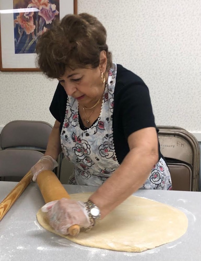 Rolling dough for choreg and katah